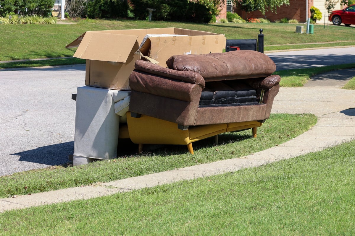 Disposing of old furniture on a sidewalk in Hampton Roads